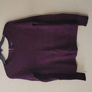 A medium AE dark purple sweater